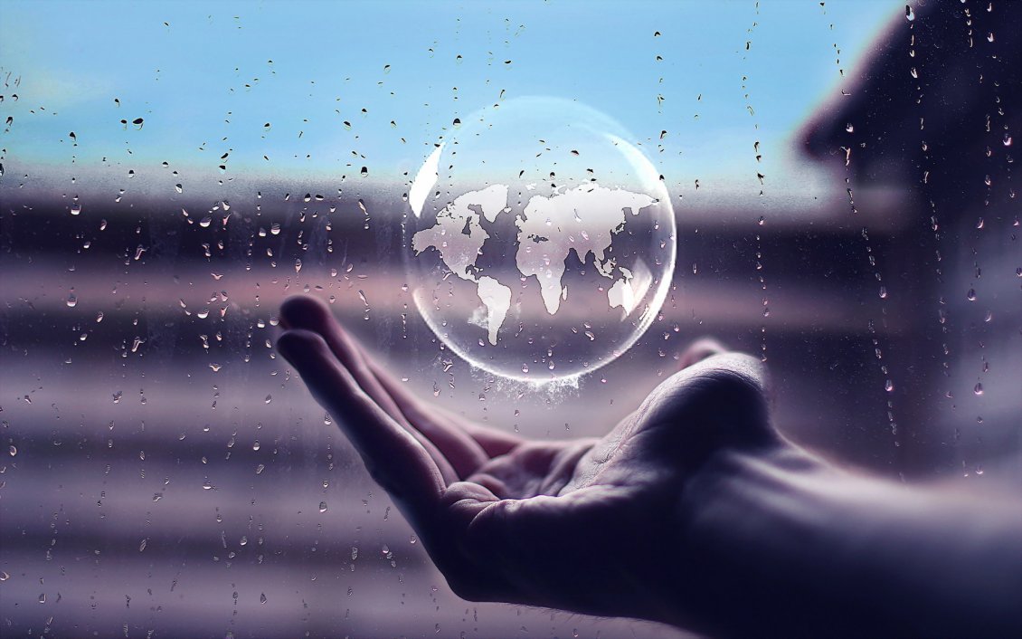 Download Wallpaper Rain bubble in hand with the earth map - Artistic wallpaper