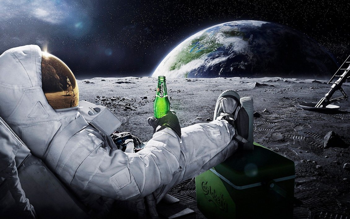 Download Wallpaper A men in space with a carlsberg beer