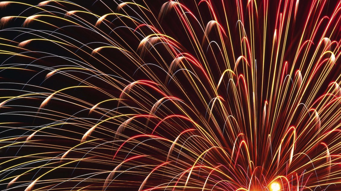 Download Wallpaper Bright red and golden fireworks in the night