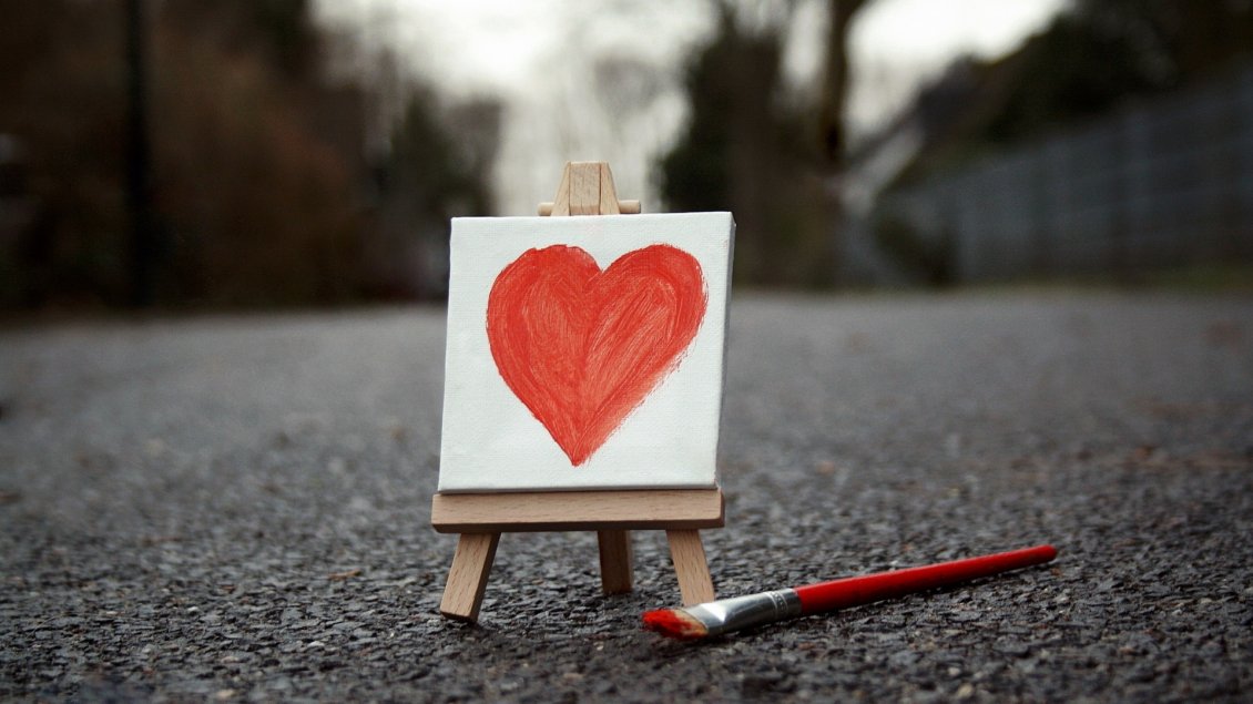Download Wallpaper Painted red heart in the middle of the road