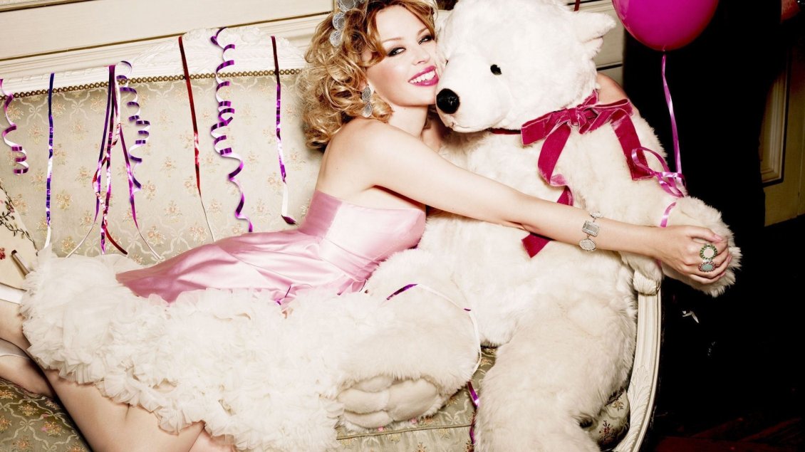 Download Wallpaper Kylie Minogue with a white plush bear