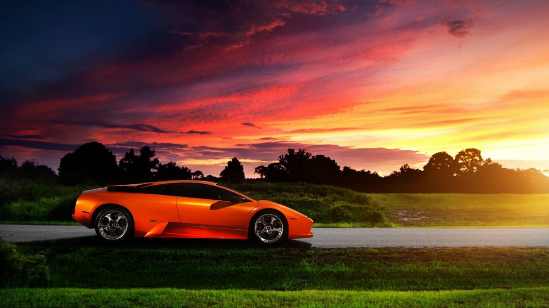 Download Wallpaper Orange Lamborghini Murcielago in the purple sunset