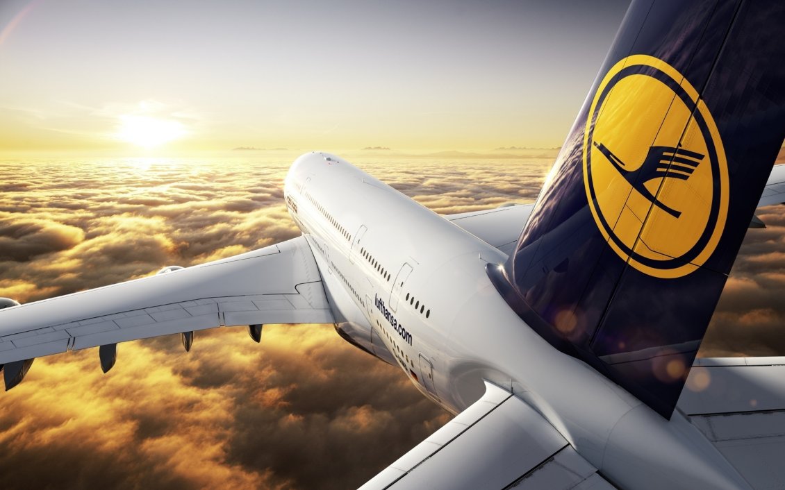 Download Wallpaper Wonderful fly with planes from Lufthansa over the clouds
