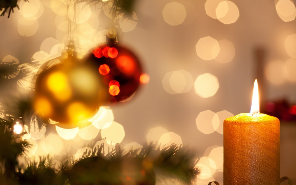 Download Wallpaper Golden candle under the Christmas tree - Magic light