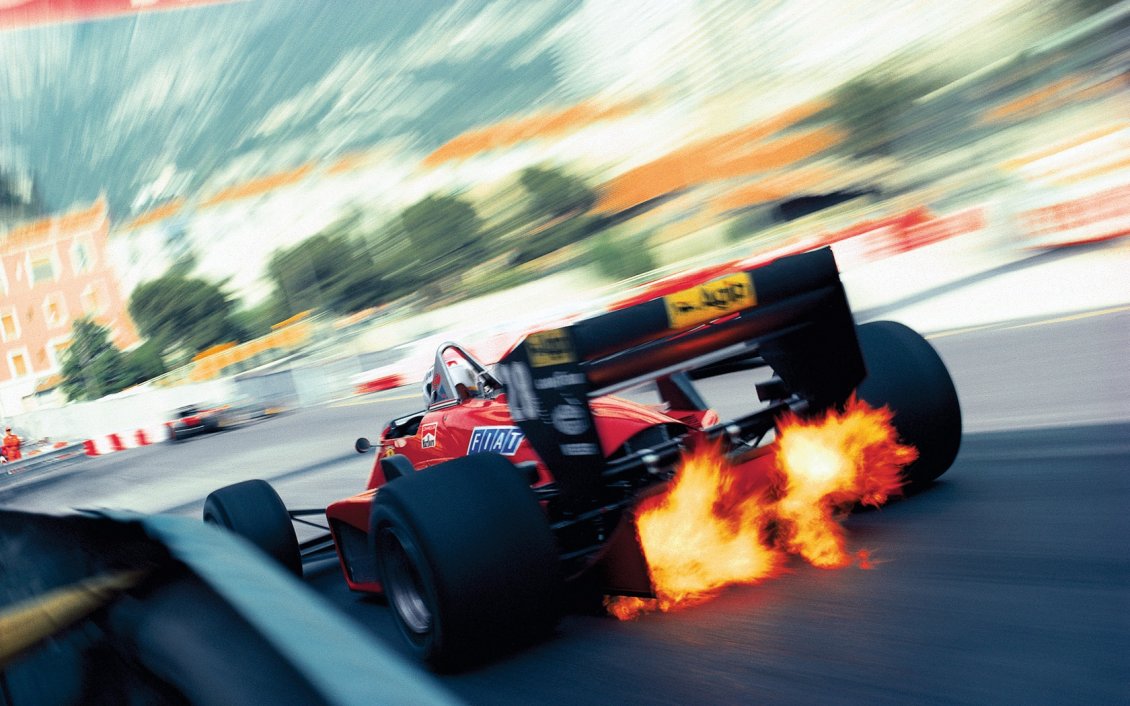 Download Wallpaper Super speed on the race - Fire from the wheels Formula 1
