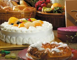 Cake with whipped cream and fruits