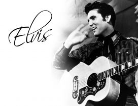 Elvis Presley with his guitar - an American singer