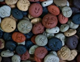 Many smiley faces in different colors