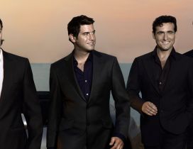 Members of Il divo band in black suits