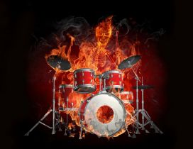 Drums and the skeleton of a man burn in flames