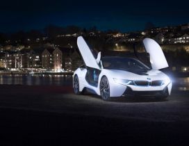 White BMW I8 Concept with opened doors in the city