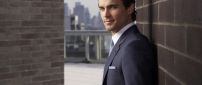Handsome Matt Bomer in blue suit poster