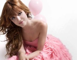 The actress Bella Thorne in a pink dress