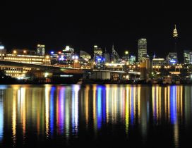 Colorful lights reflected in water in night - Sydney Anzac