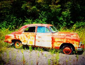 Abandoned car destroyed by rust