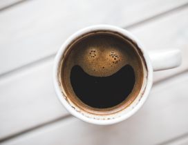 Big smile in a cup of coffee - Happy morning day