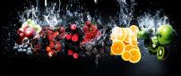 Fresh fruits under the cold water - HD summer time