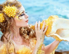Beautiful golden mermaid and shell - Professional makeup