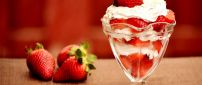 Delicious strawberry cake on a glass with cream - HD sweet