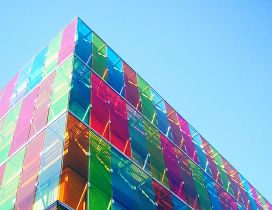 Big architectural building with colourful glass walls
