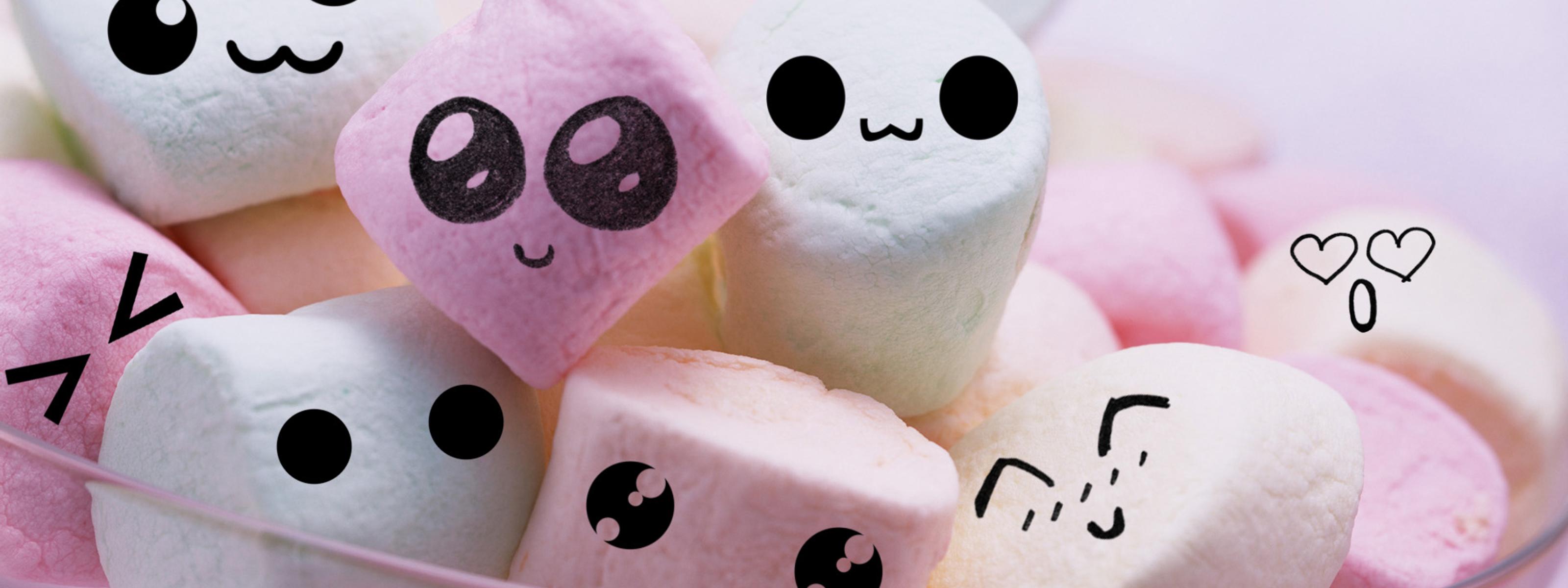 Cute and funny faces on marshmallows