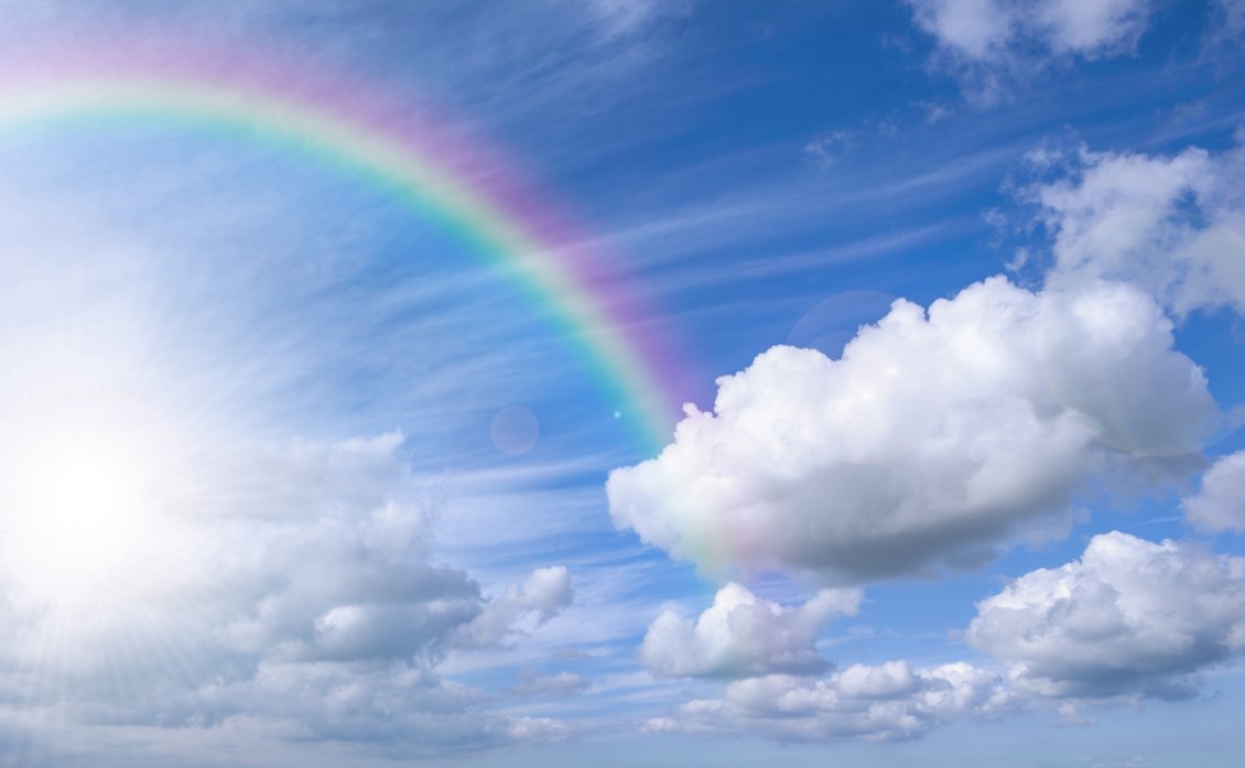 Download Wallpaper Rainbow over the blue sky