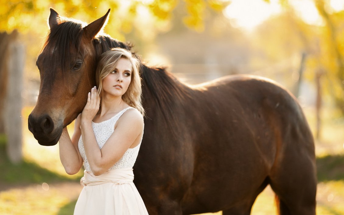 Download Wallpaper Pretty blonde girl and a brown horse
