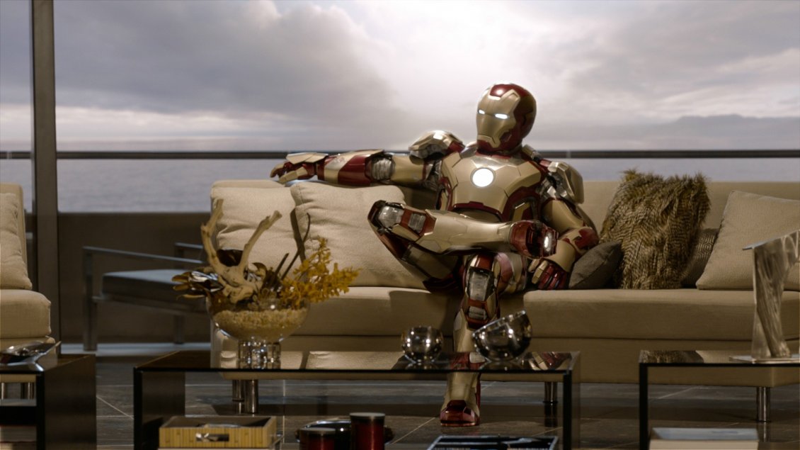 Download Wallpaper Iron Man sits on a sofa