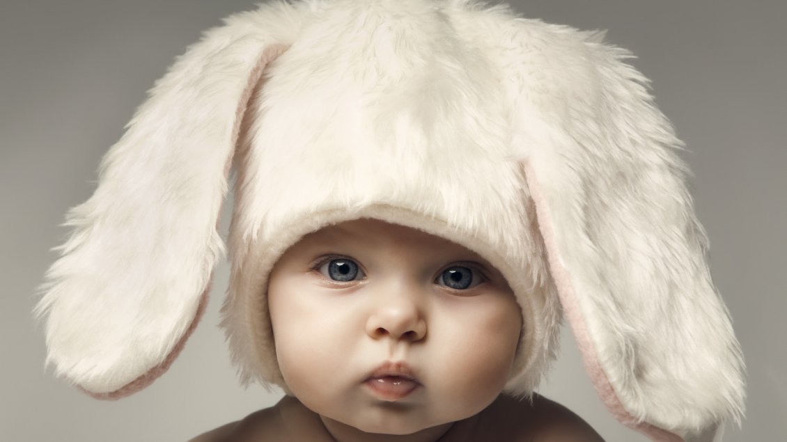 Download Wallpaper Cute child with white hat with bunny ears