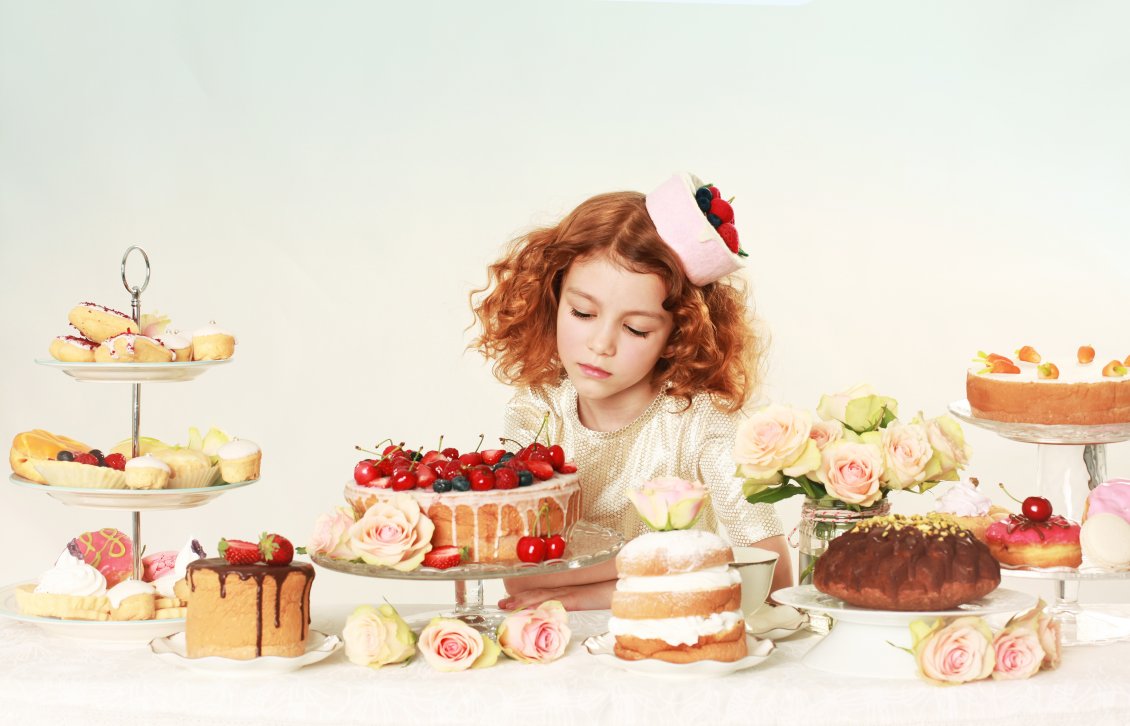 Download Wallpaper The girl looks long at cakes on the table