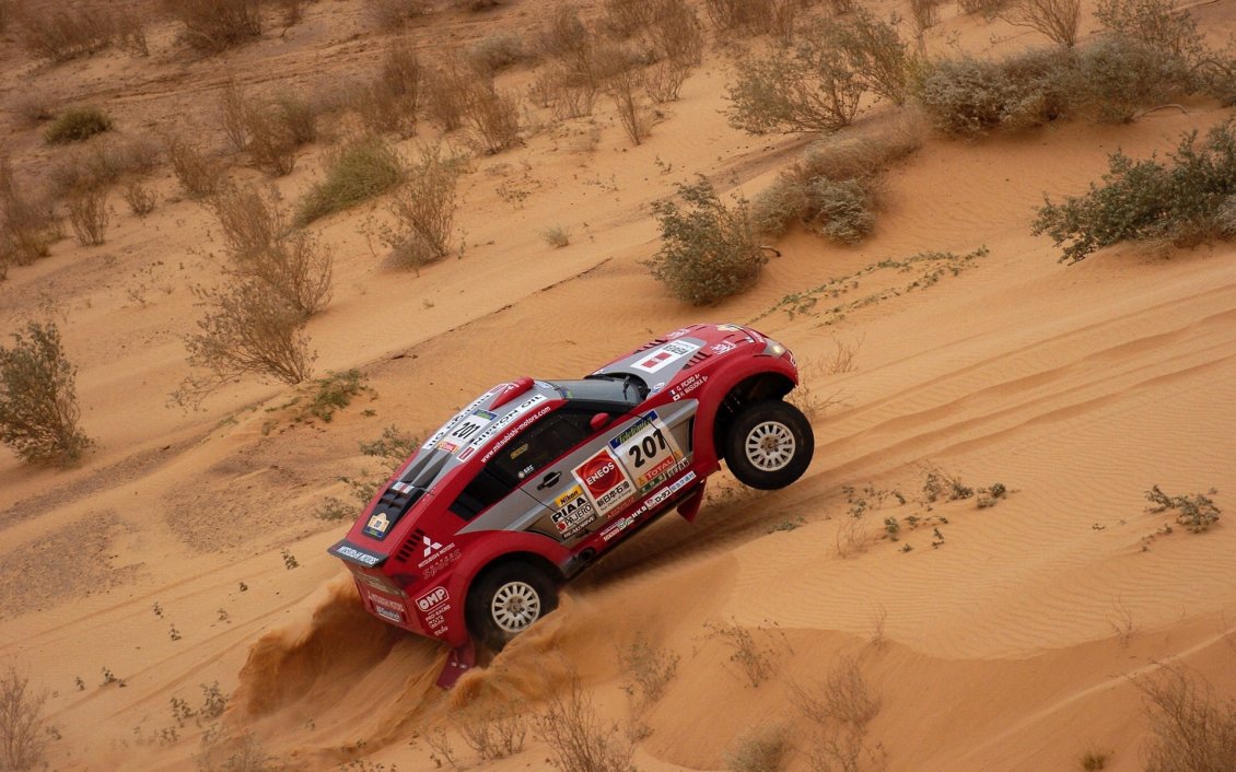 Download Wallpaper Dakar rally red car in the desert