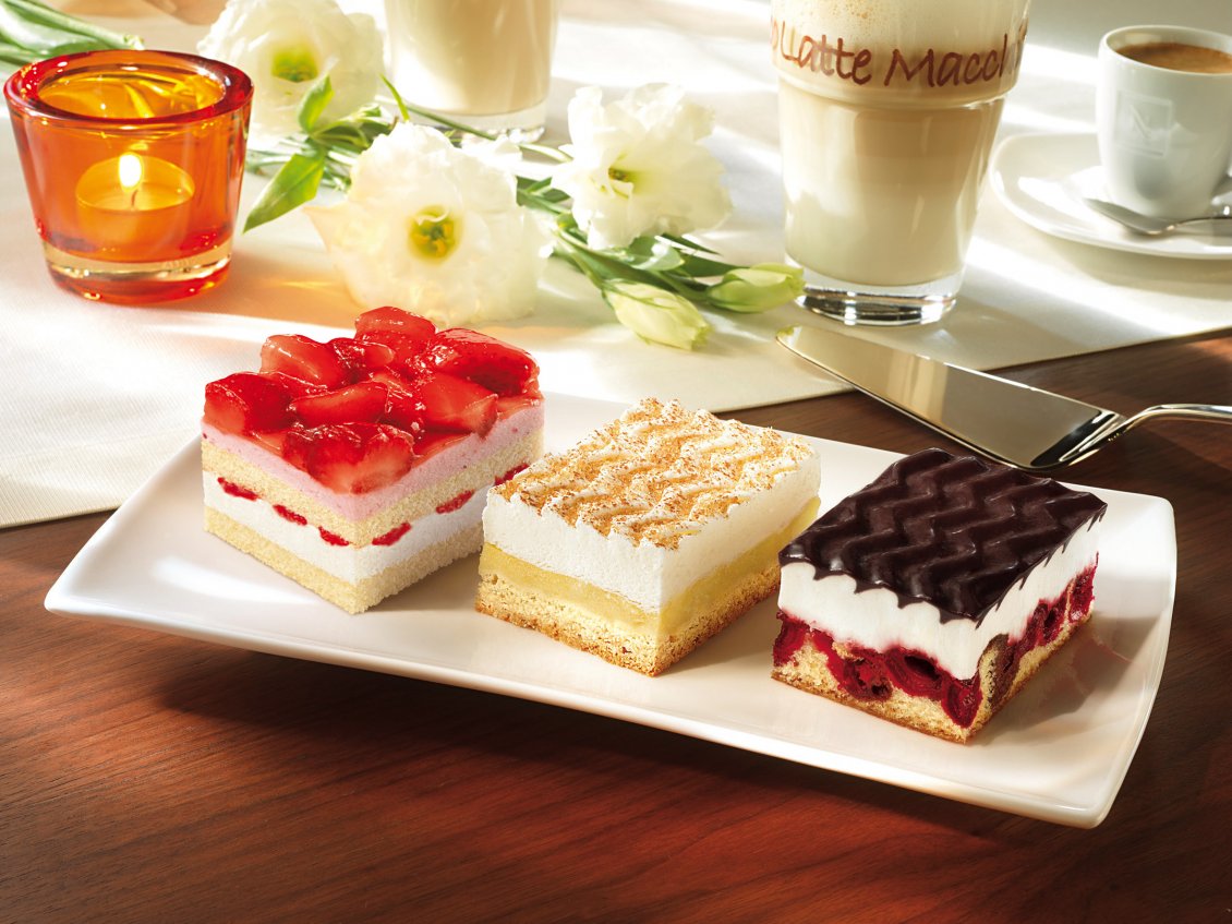 Download Wallpaper Three pieces of different cakes and latte macchiato