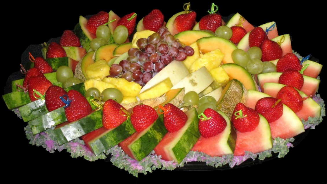 Download Wallpaper Many pieces of fruits arranged on a plate
