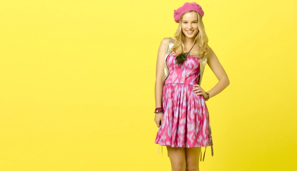 Download Wallpaper Bridgit Mendler in pink dress on the yellow background
