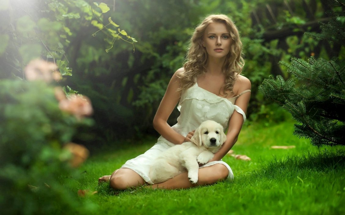 Download Wallpaper A girl with her white puppy on the grass in garden