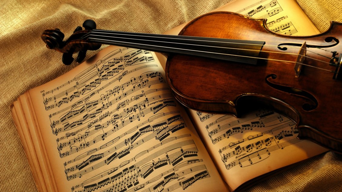 Download Wallpaper A violin on a music book - Music wallpaper