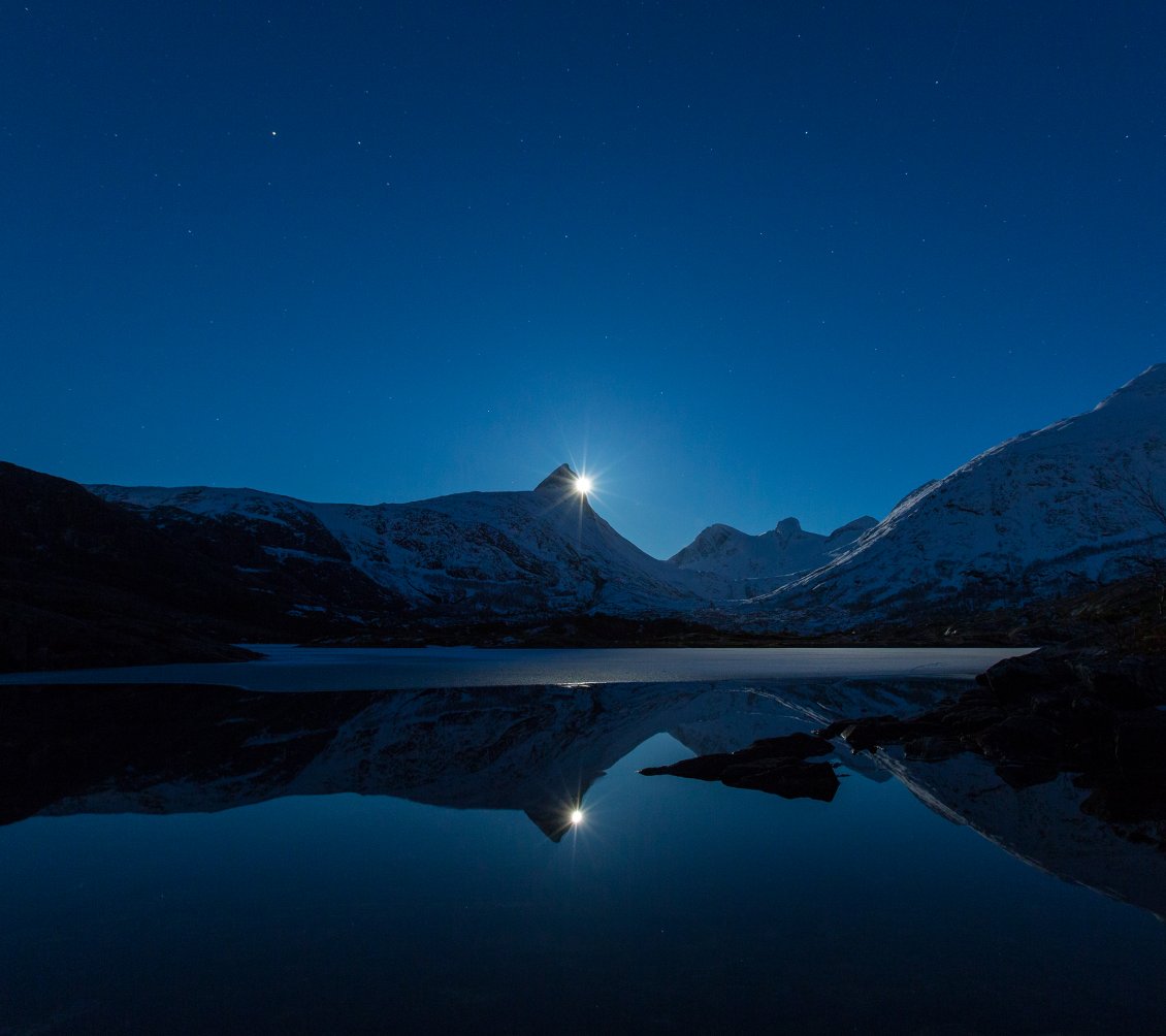 Download Wallpaper The moon rising over the mountains