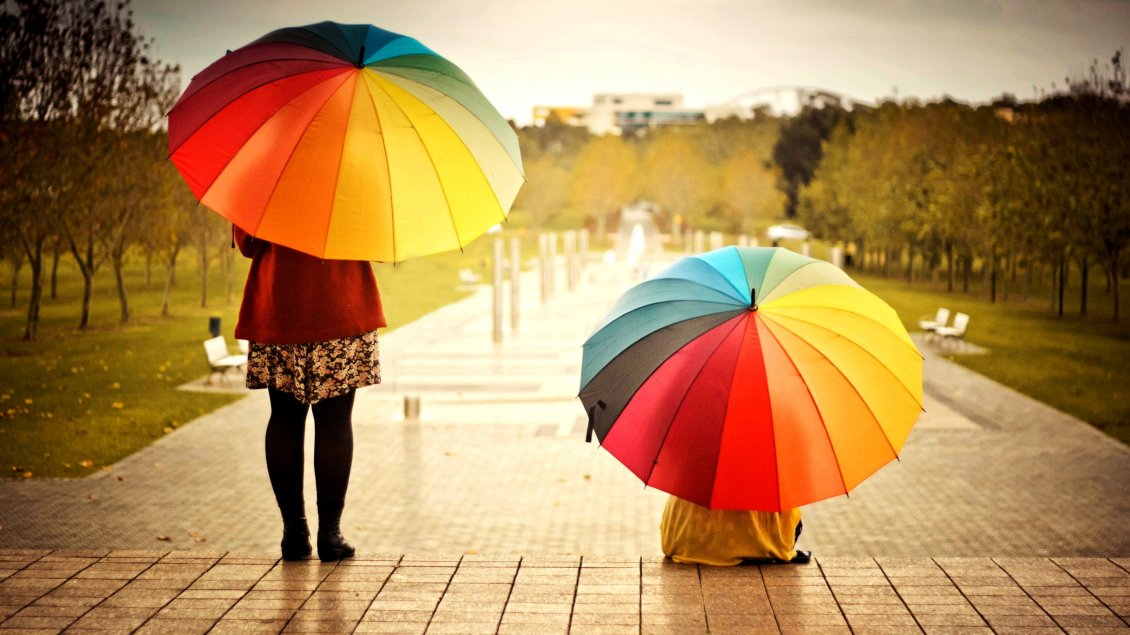Download Wallpaper Two women with colorful umbrellas in the rain