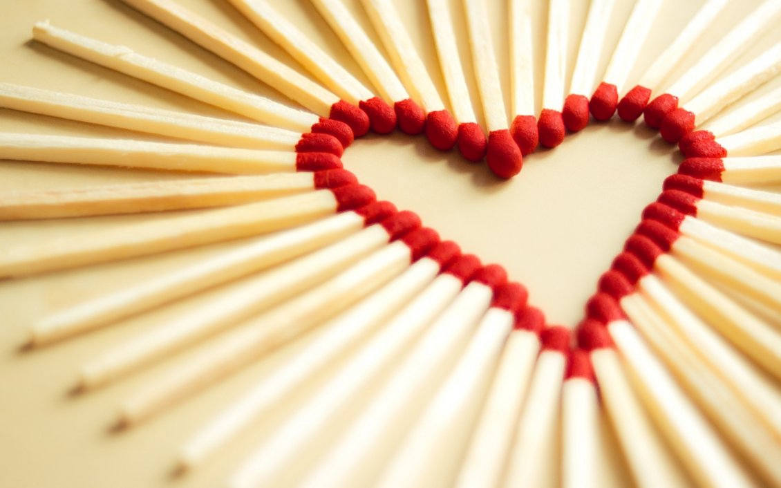 Download Wallpaper A red heart made of many matches