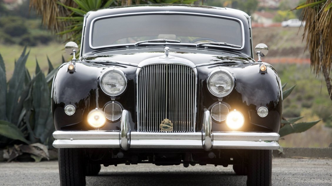 Download Wallpaper Black Classic Jaguar on road - Vintage car