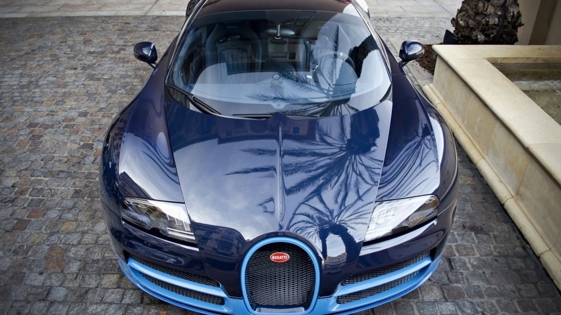 Download Wallpaper Blue Bugatti Veyron front view on sidewalk