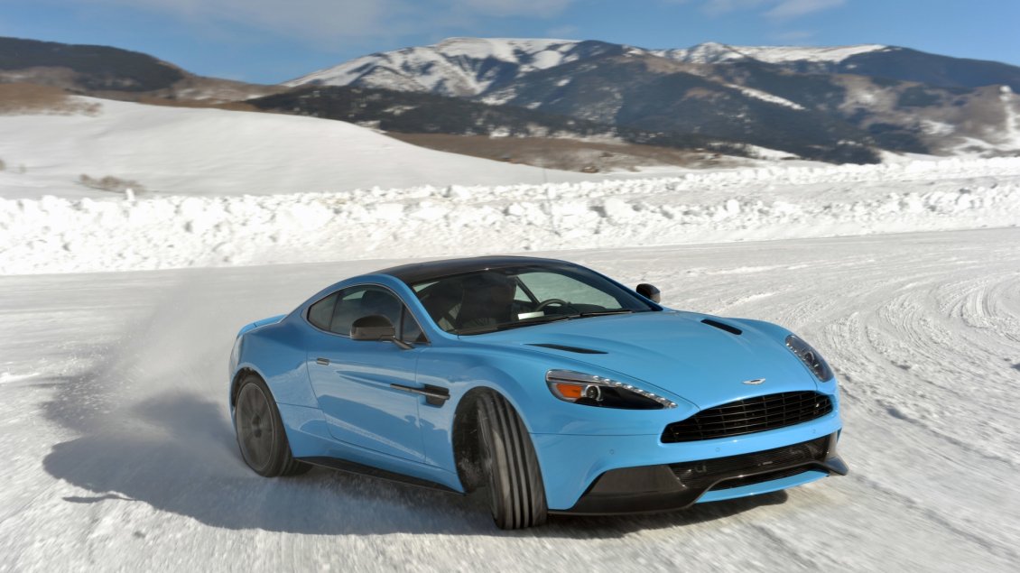 Download Wallpaper Blue Aston Martin Vanquish on snow