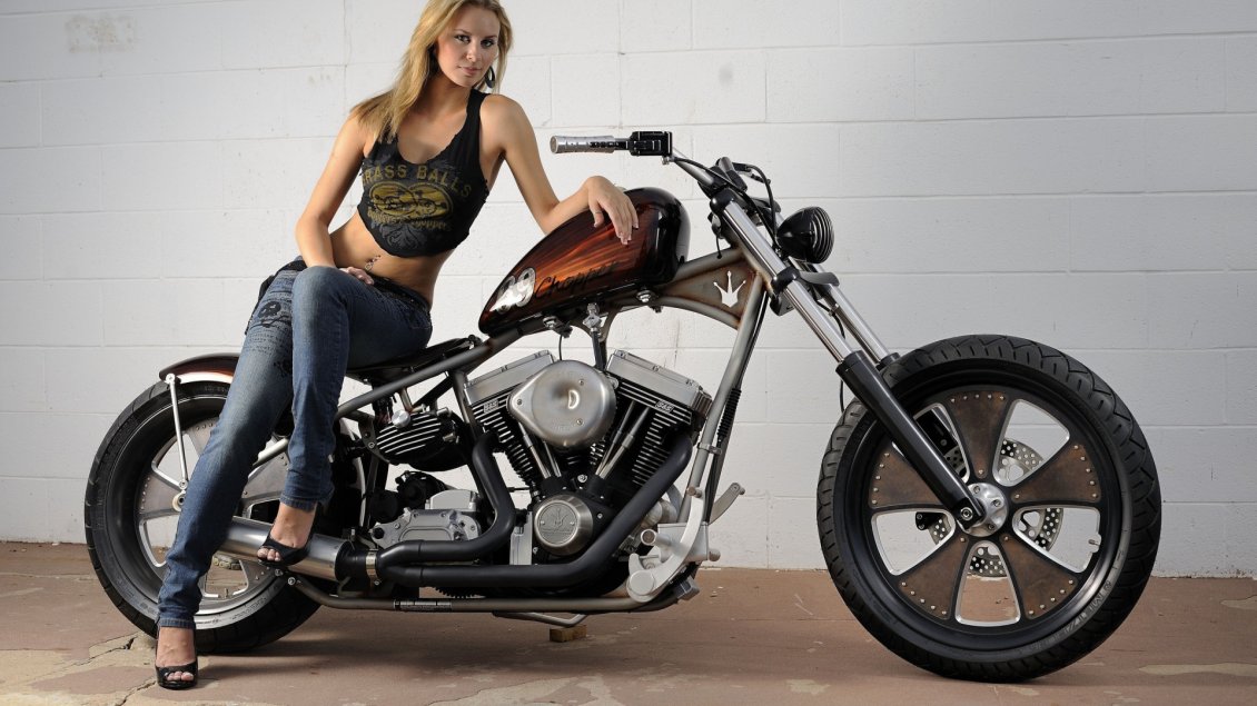 Download Wallpaper A girl on the Harley Davidson Classic Bobber motorcycle