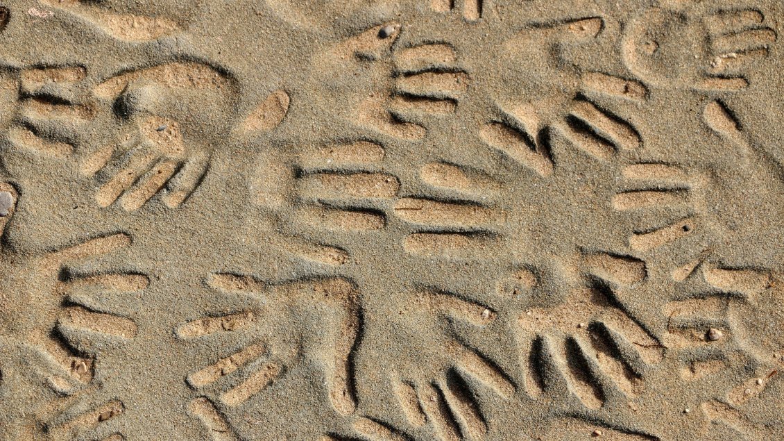 Download Wallpaper Handprints in the beach sand - HD wallpaper