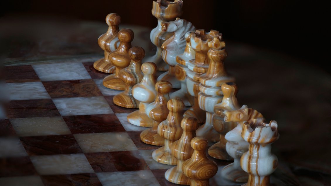 Download Wallpaper Brown and white chess pieces on chessboards