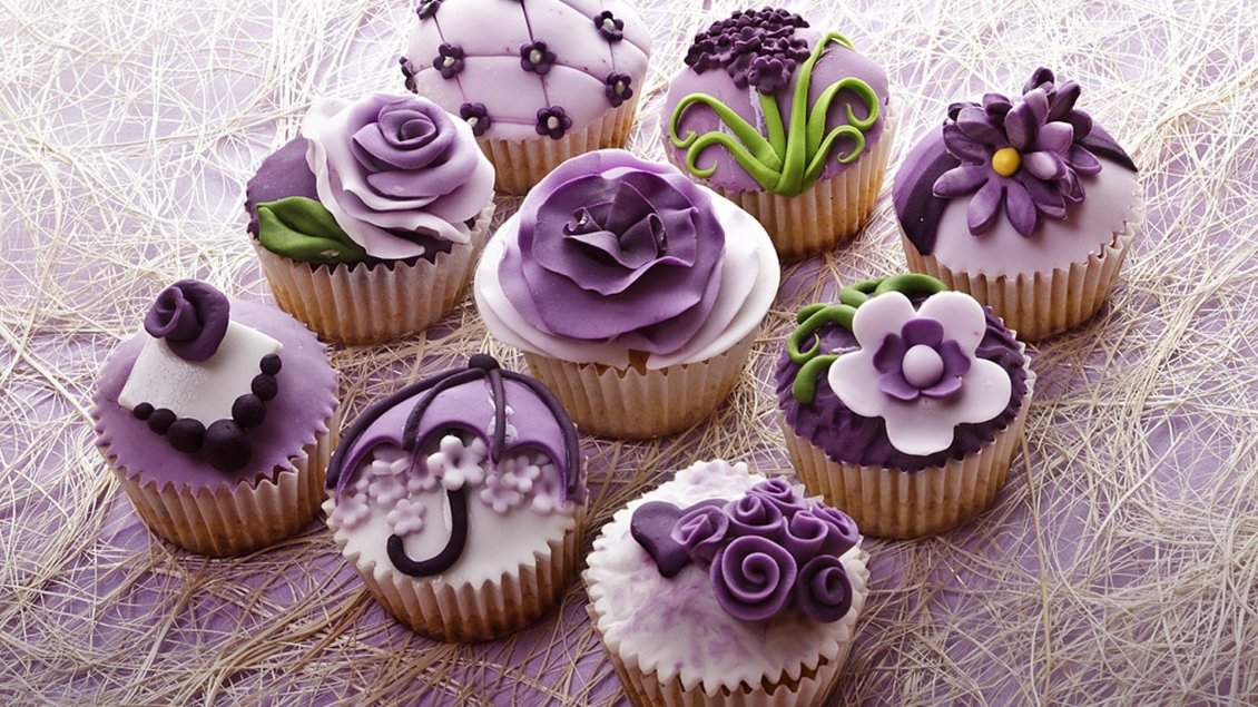 Download Wallpaper Muffins decorated with purple flowers made of sugar