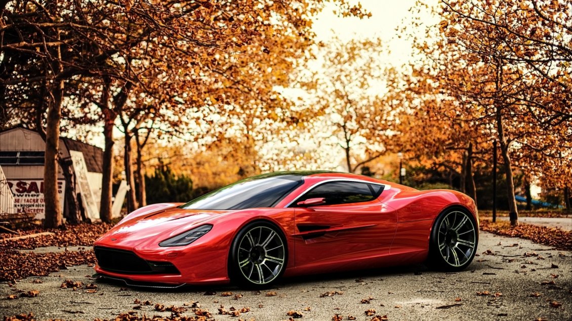 Download Wallpaper Red Aston Martin in a park in a autumn day