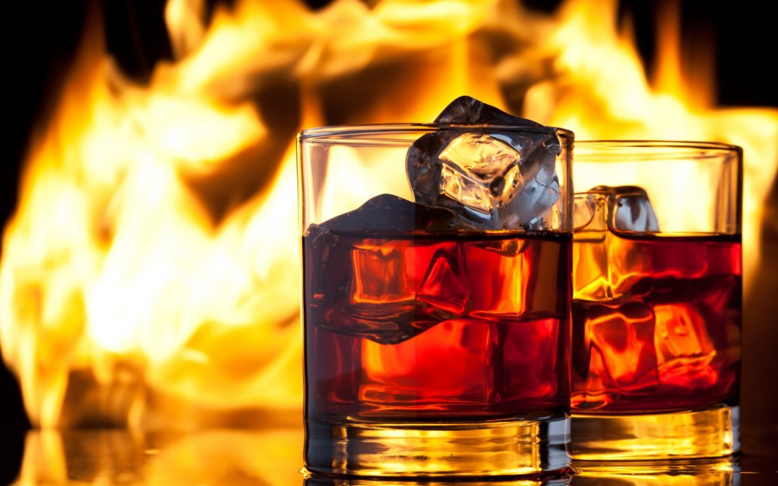 Download Wallpaper Two glasses of whiskey with ice - fire on background