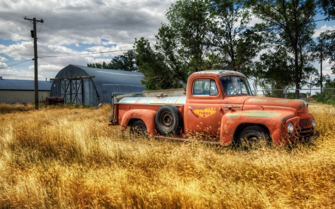 Download Wallpaper Old red truck in the wheat field - HD wallpaper