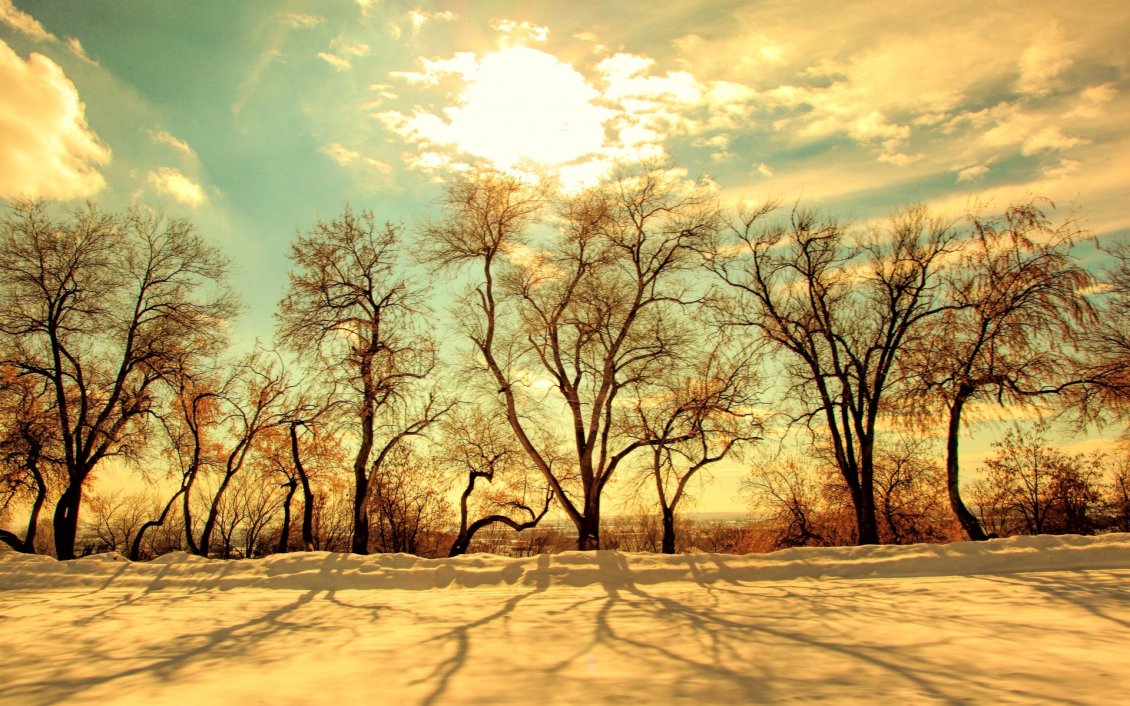 Download Wallpaper Beautiful sunset over the nature in a cold winter day